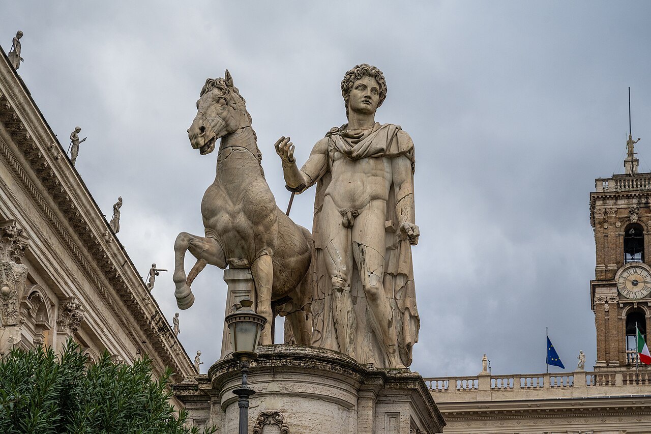 One of the Dioscuri with his horse on the balustrade of the Campidoglio, the Senate tower behind