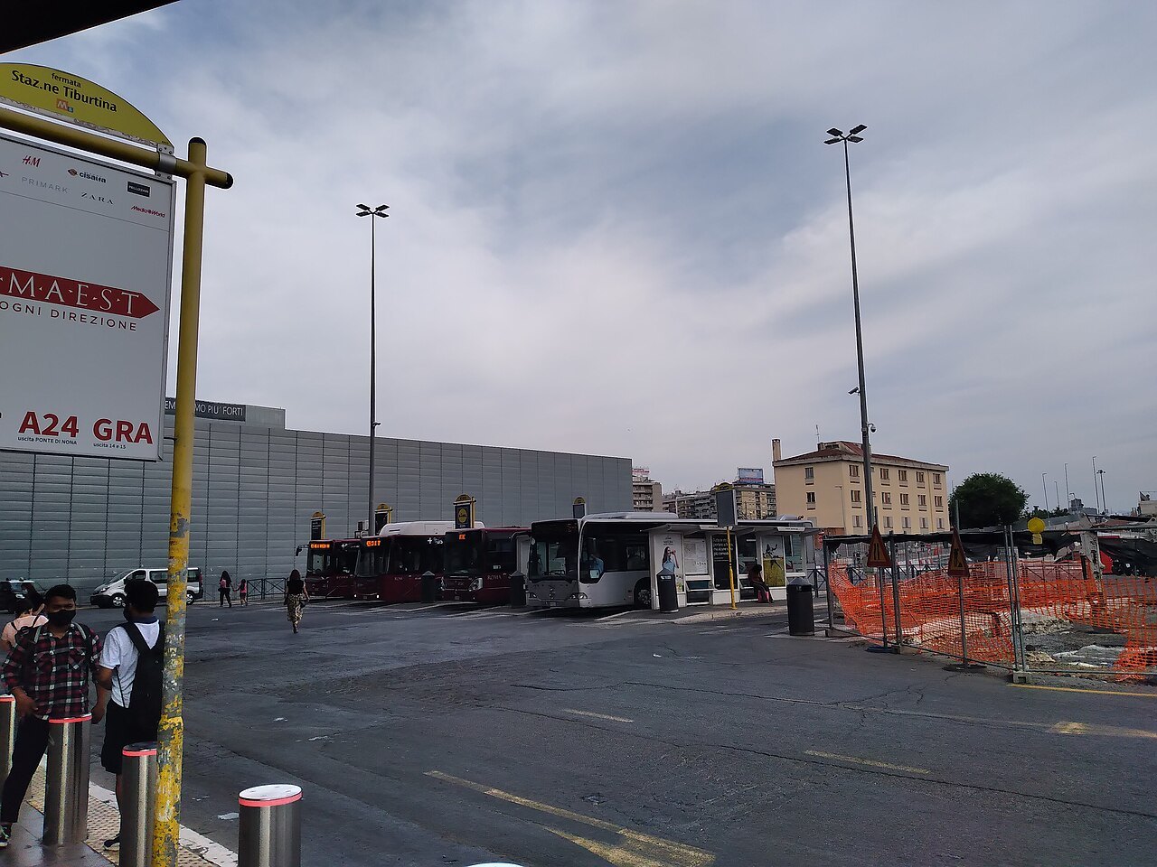 The bus terminus at Tiburtina station, buses parked beyond a wide road