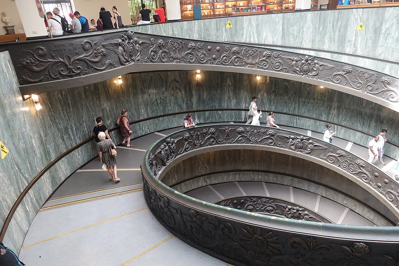 Visitors on the double spiral staircase of the Vatican Museums, seen from above