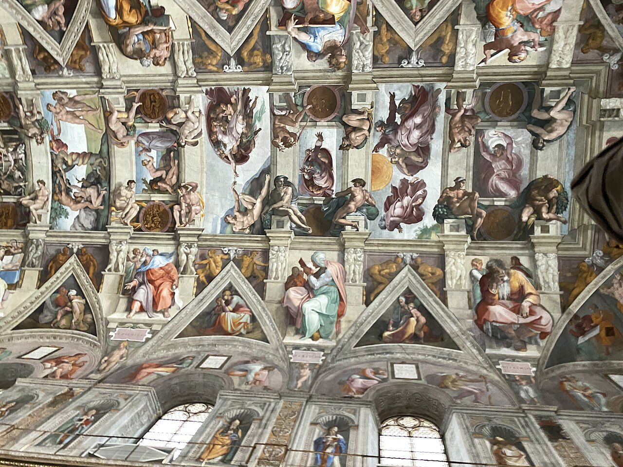 Michelangelo's ceiling in the Sistine Chapel: prophets, sibyls and the Genesis scenes in their painted frame