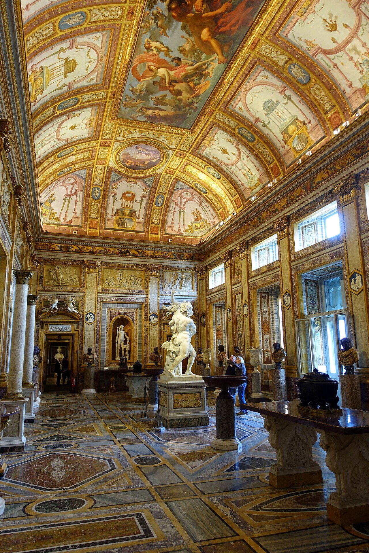 The Room of the Emperors in the Borghese Gallery, with Bernini's Pluto and Proserpina in the middle