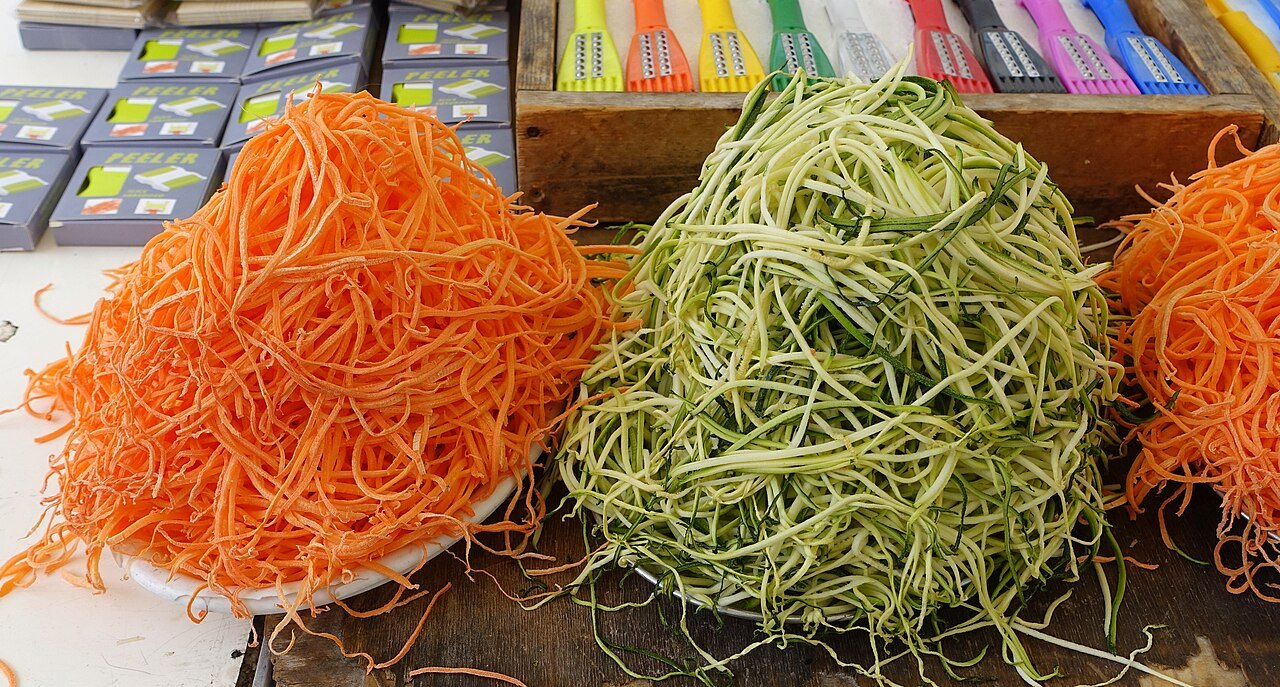 Carrots and zucchini cut into long strands on a market stall in Campo de' Fiori