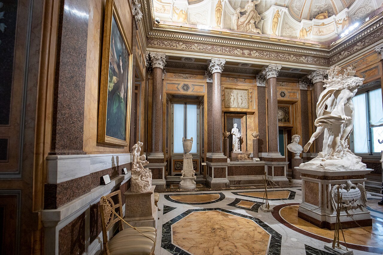 Bernini's Apollo and Daphne in its room at the Borghese Gallery, among columns and marble