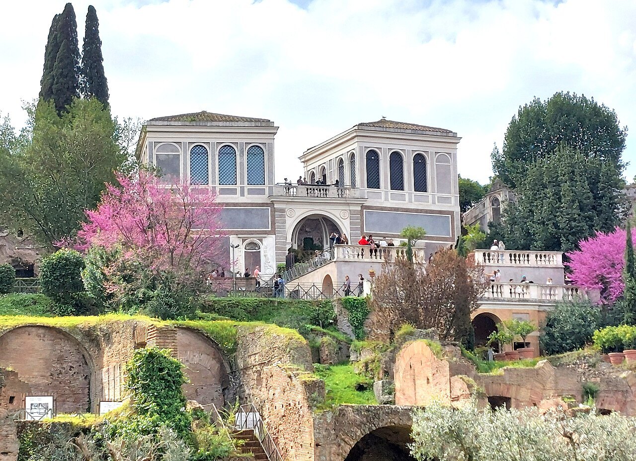 The Farnese Gardens on the Palatine, their pavilion above the ruins, trees in pink blossom