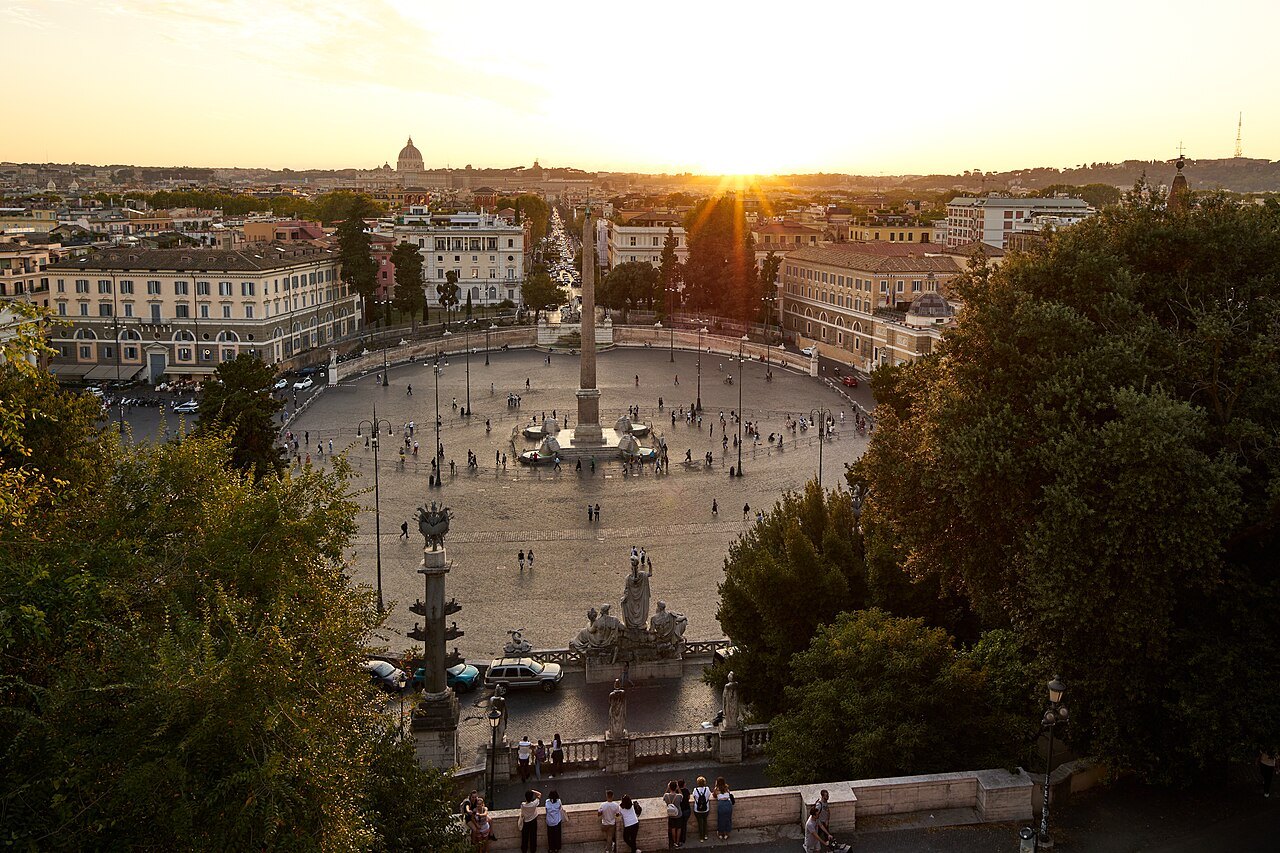 Piazza del Popolo from the Pincio at sunset, the dome of St. Peter's on the horizon