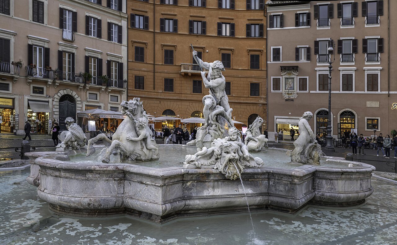 The Fountain of Neptune in Piazza Navona, the god wrestling a sea creature above the basin
