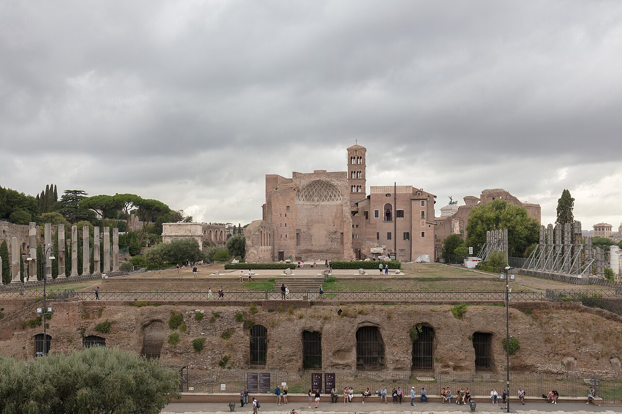 The Temple of Venus and Rome, its apse in brick and a line of column stumps across a broad terrace