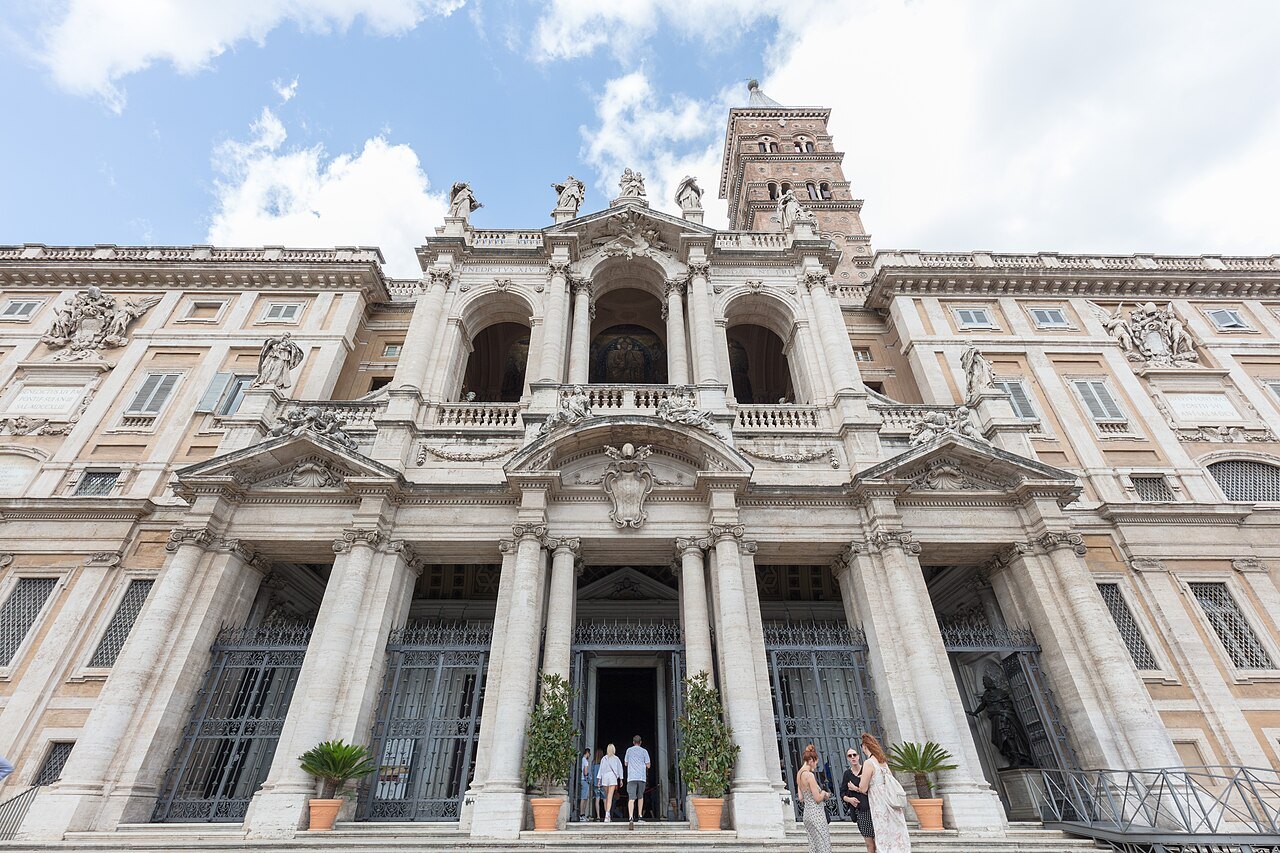 Fuga's loggia on the front of Santa Maria Maggiore, the medieval bell tower behind