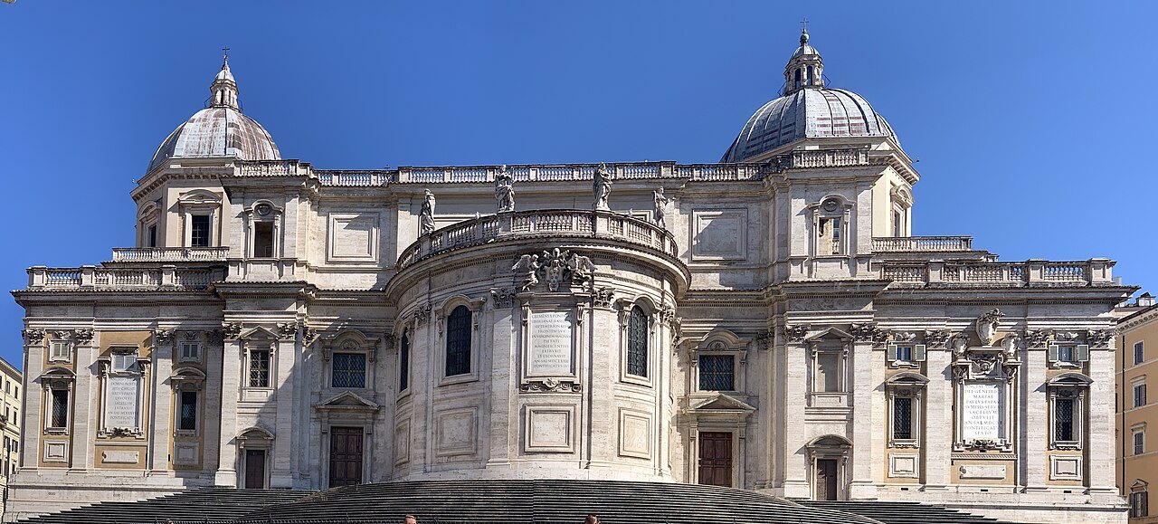 The apse end of Santa Maria Maggiore on the Esquiline, its two domes against a blue sky