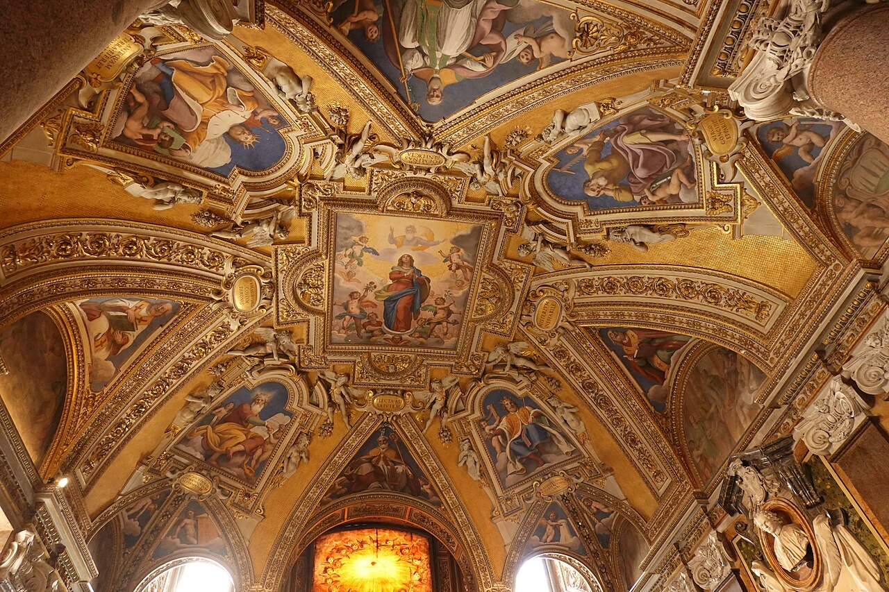 A domed chapel of Santa Maria Maggiore painted with frescoes in gold and color