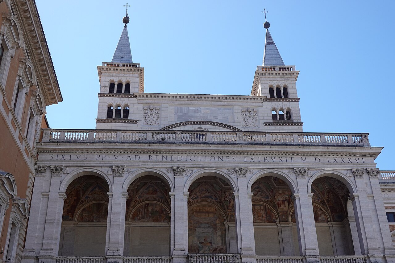 The portico and twin bell towers of St. John Lateran seen from below