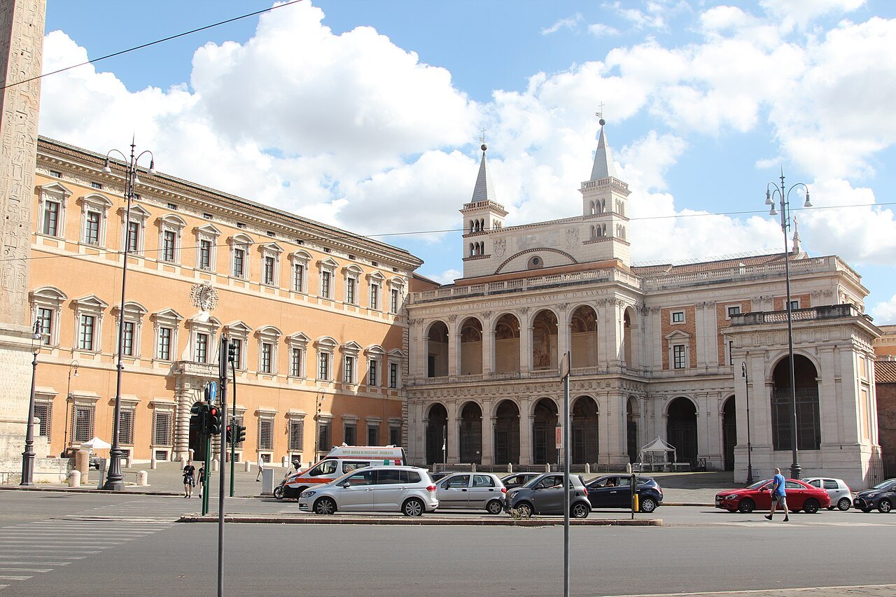 The side of St. John Lateran with its portico and bell towers beside the Lateran Palace