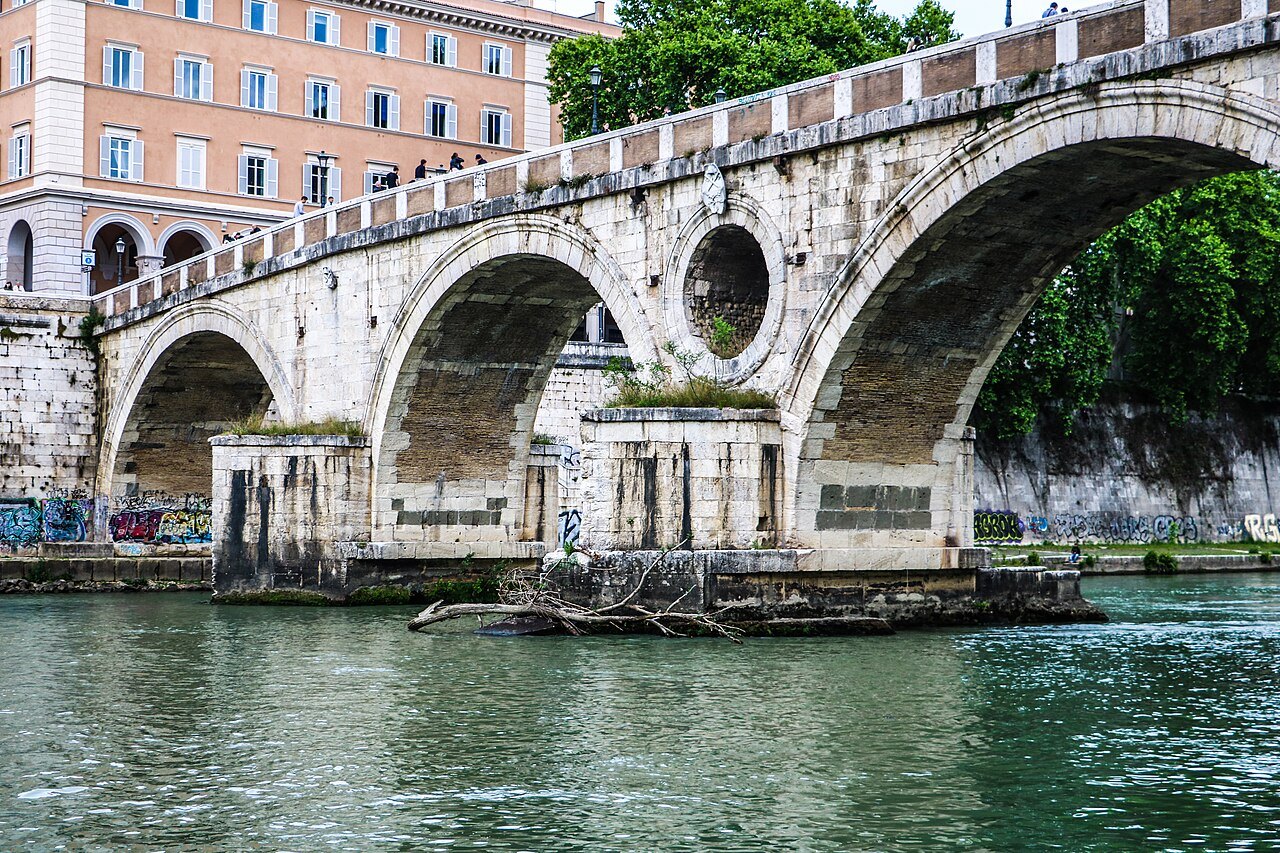The arches of the Ponte Sisto over the Tiber, with the round opening in its middle pier