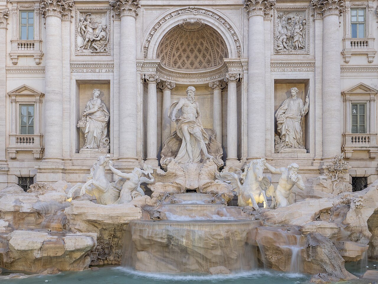 The statues and cascades of the Trevi Fountain seen close