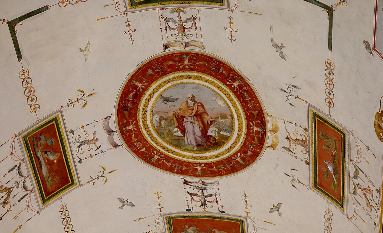 A painted ceiling medallion framed by decorative panels in the Vatican Museums