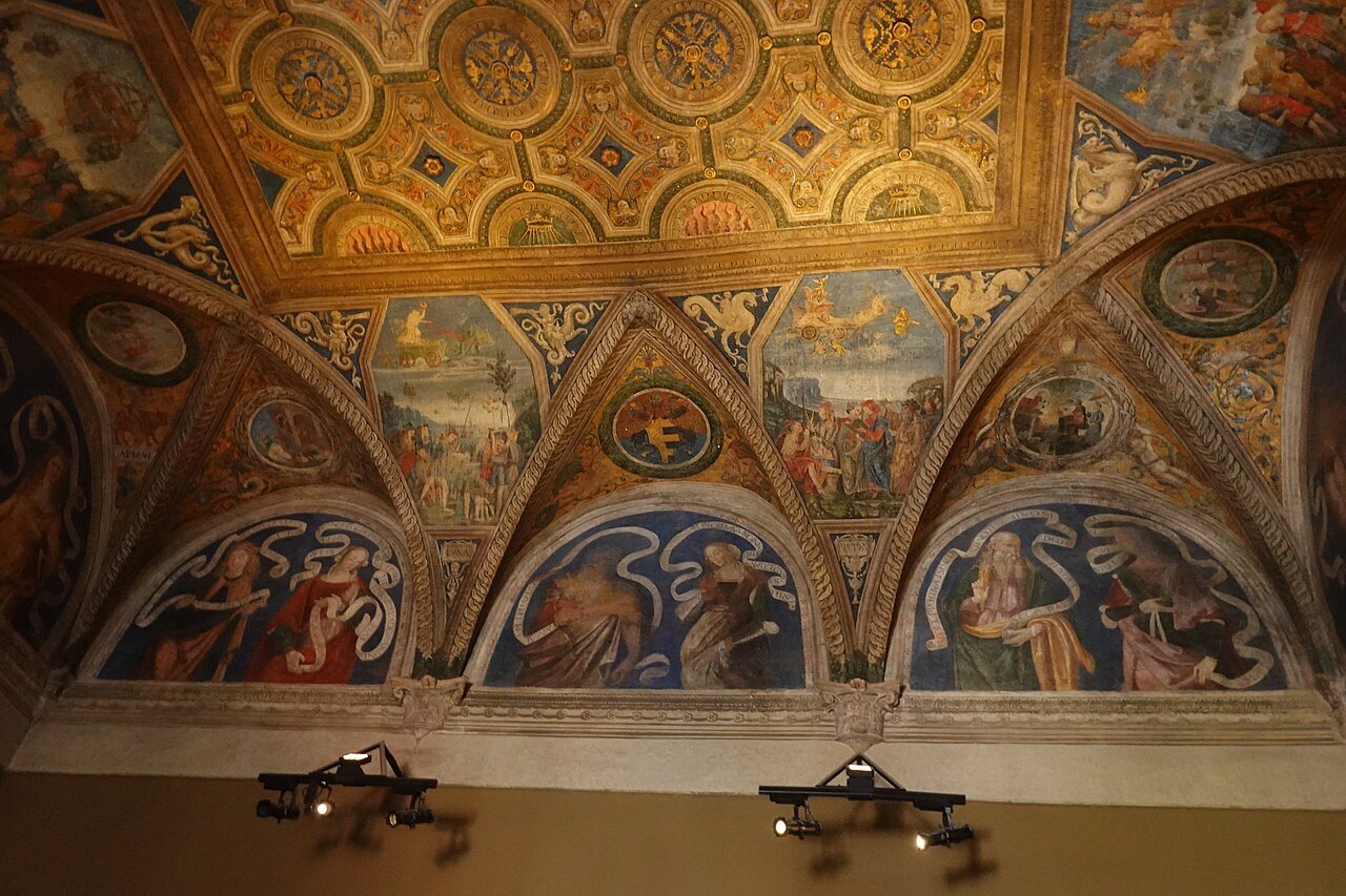 A vault painted with frescoes and gilded coffering in the Vatican Museums